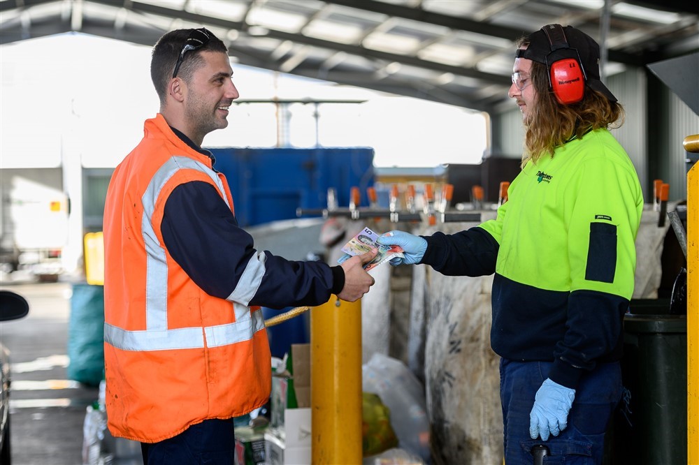 Convenient recycling solutions designed for easy and efficient waste disposal Waste sorting facility showcasing leaders in recycling handling materials efficiently